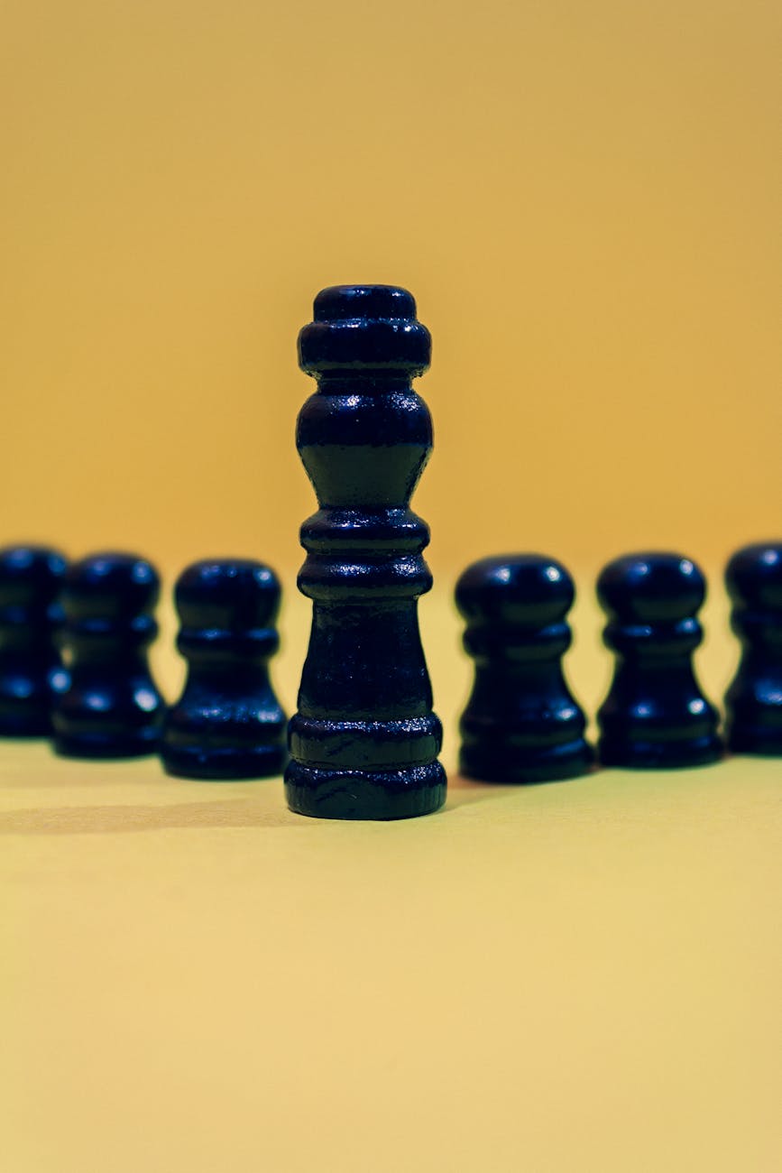 chess pieces on yellow background